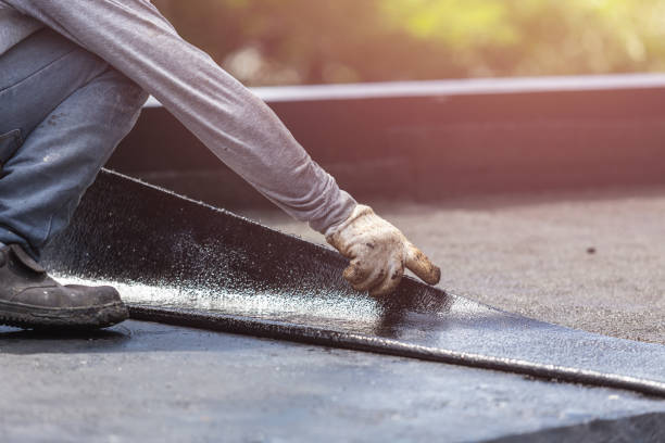 Professional Waterproofing technician working in Bourbon, IN